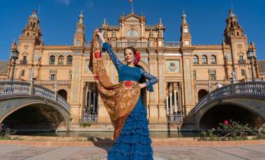 Typical Spanish woman dancing flamenco in Seville, Andalusia, Spain.-min